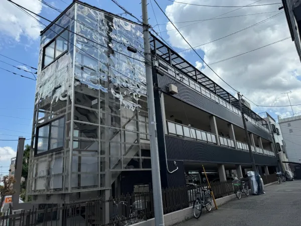 川崎市中原区　マンション大規模修繕工事：外壁のサイディングカバー工事にてイメージを一新